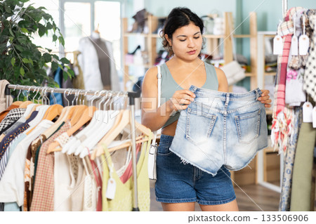Girl at trading floor pick out and buying shorts Girl at trading floor pick out and buying shorts 133506906