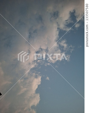 Blue Sky With White Clouds Over Calm Horizon, Peaceful Natural Scene Blue Sky With White Clouds Over Calm Horizon, Peaceful Natural Scene 133507580