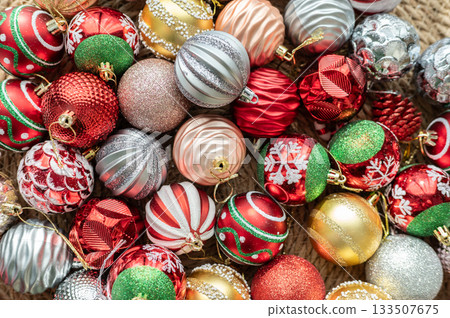 Group of Christmas ornaments prepare for decorative to a Christmas tree. Hanging religious ornaments on a tree was a way to honor the true meaning of Christmas, Jesus Christ's birth. Group of Christmas ornaments prepare for decorative to a Christmas tree. Hanging religious ornaments on a tree was a way to honor the true meaning of Christmas, Jesus Christ's birth. 133507675