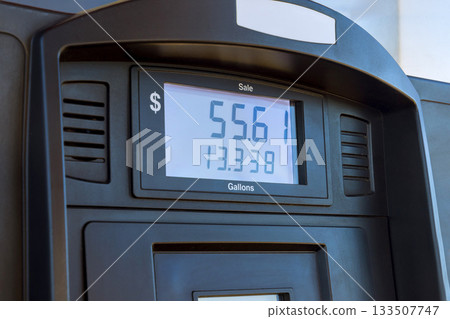 Gas station pump displays total sale amount gallons pumped 133507747