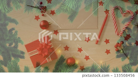 Displaying flat lay featuring kraft paper envelope, red gift box, candy cane heart on wooden table Displaying flat lay featuring kraft paper envelope, red gift box, candy cane heart on wooden table 133508456