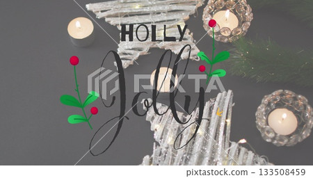 Displaying glittered star ornaments, lit tealights, pine and holly under HOLLY Jolly on tabletop Displaying glittered star ornaments, lit tealights, pine and holly under HOLLY Jolly on tabletop 133508459