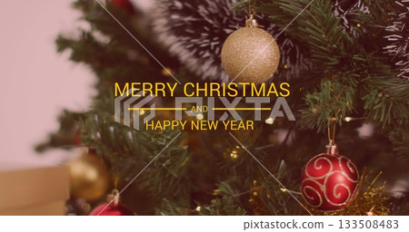 Showing decorated evergreen tree at home, with baubles, tinsel, lights, Merry Christmas text 133508483