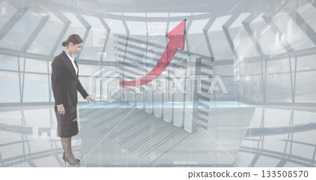 Female analyst in suit examining holographic 3D bar chart in futuristic office, copy space 133508570