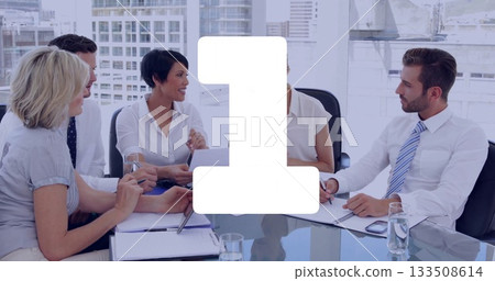 Collaborating business professionals gesturing and jotting notes in conference room, with notebooks Collaborating business professionals gesturing and jotting notes in conference room, with notebooks 133508614