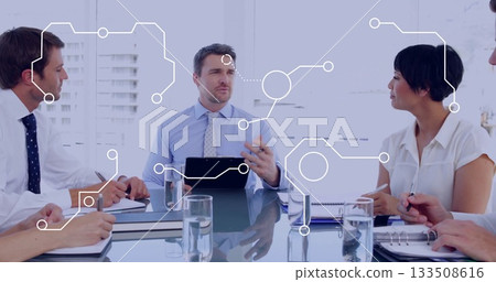 Presenting business professional holding tablet and speaking in conference room, with tech graphics Presenting business professional holding tablet and speaking in conference room, with tech graphics 133508616