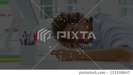 Leaning forward office worker dozing on arms at office desk, with monitor and folders, copy space Leaning forward office worker dozing on arms at office desk, with monitor and folders, copy space 133508647
