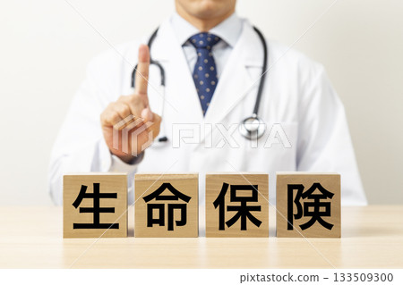 A block with the word "life insurance" and a doctor A block with the word "life insurance" and a doctor 133509300