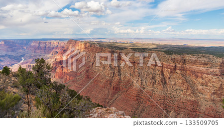 Sweeping Grand Canyon Vista with Cliff Face and Distant Desert Sweeping Grand Canyon Vista with Cliff Face and Distant Desert 133509705