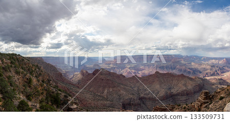 Wide Panorama of Grand Canyon Gorge with Dramatic Overcast Sky 133509731