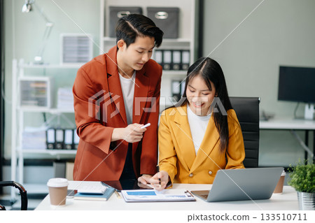 Asian female marketing manager with Kind leader executive manager share and discuss business solutions plan ideas Asian female marketing manager with Kind leader executive manager share and discuss business solutions plan ideas 133510711