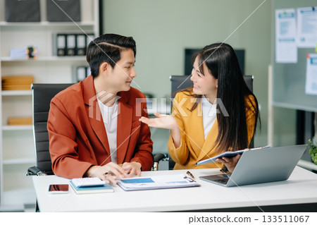 Asian female marketing manager with Kind leader executive manager share and discuss business solutions plan ideas Asian female marketing manager with Kind leader executive manager share and discuss business solutions plan ideas 133511067