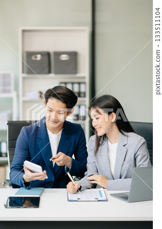 Asian female marketing manager with Kind leader executive manager share and discuss business solutions plan ideas Asian female marketing manager with Kind leader executive manager share and discuss business solutions plan ideas 133511104