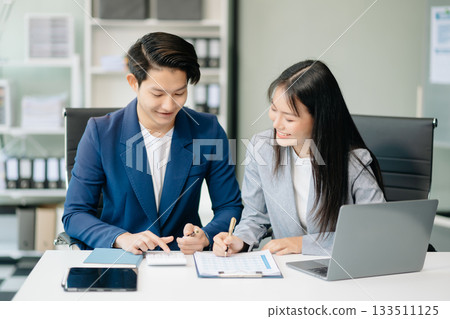 Asian female marketing manager with Kind leader executive manager share and discuss business solutions plan ideas 133511125