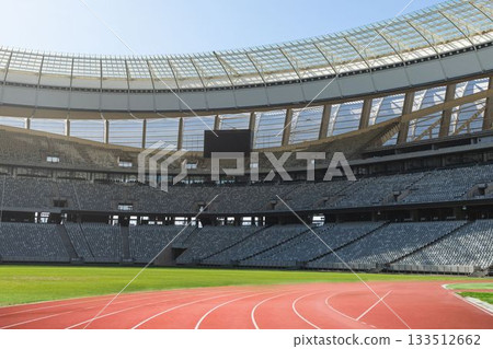 Modern athletics stadium is featuring red track, green infield and gray seating in flat design 133512662