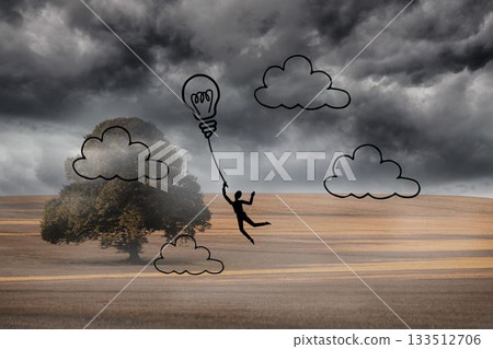 Light bulb balloon over cloudy landscape 133512706