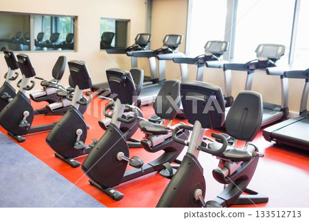 Exercise equipment in health club Exercise equipment in health club 133512713