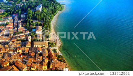 Blue seaside in front of the city 133512961