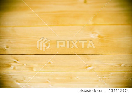 Wooden planks are creating uniform honey-colored flat design surface showing natural grain Wooden planks are creating uniform honey-colored flat design surface showing natural grain 133512974