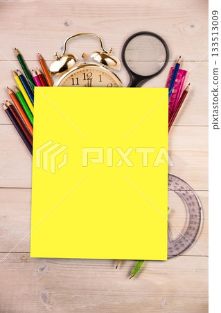 Students desk with yellow page Students desk with yellow page 133513009
