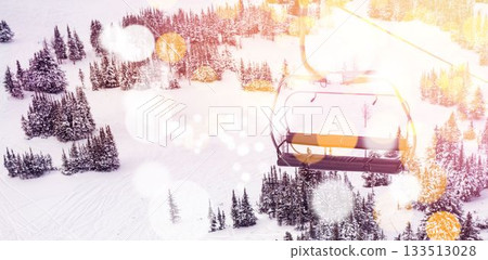 Ski lift over snow covered mountain Ski lift over snow covered mountain 133513028