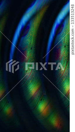 Defocused gasoline acid. Light liquid. Green blue orange colorful ink curve pigment acrylic neon bubble floating on abstract art background. Defocused gasoline acid. Light liquid. Green blue orange colorful ink curve pigment acrylic neon bubble floating on abstract art background. 133513248