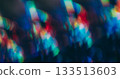 Bokeh prism. Rainbow leak. Spectrum defocused kaleidoscopic glow on abstract black background. Red blue green colorful flash texture. 133513603