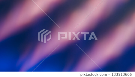 Blur light leak. Neon luminosity. Purple bright striping kaleidoscopic pattern on dark blue abstract background. Prism color art ray effect. 133513606