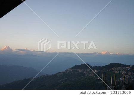 Evening Glow over Himalayan Foothills Town 133513609