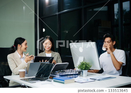 Group of Asian business meeting in planning design in creative business discussing work 133513645