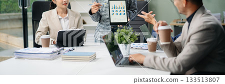 Group of Asian business meeting in planning design in creative business discussing work 133513807