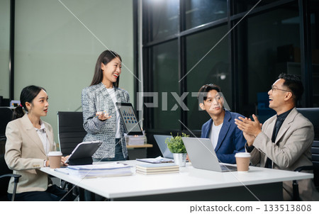 Group of Asian business meeting in planning design in creative business discussing work Group of Asian business meeting in planning design in creative business discussing work 133513808