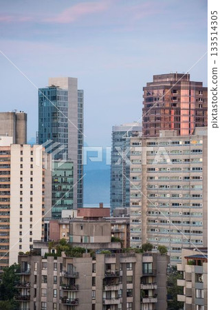 Modern towers in city against sky Modern towers in city against sky 133514305