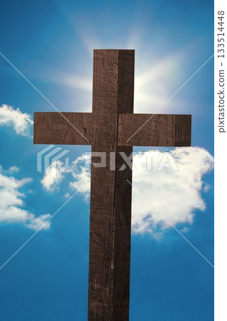 Flat design is featuring rough wooden cross against blue sky with clouds, sun casting halo glow 133514448