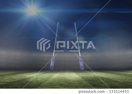 Flat design rugby goalposts are standing on green grass pitch under stadium floodlights at night 133514453