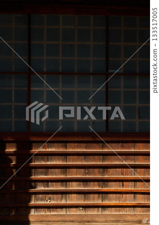 Wooden sliding door at the entrance of a traditional Japanese building Wooden sliding door at the entrance of a traditional Japanese building 133517005