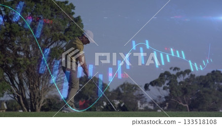 Preparing golf swing, golfer gripping club on fairway, with candlestick bars and trendline overlay 133518108