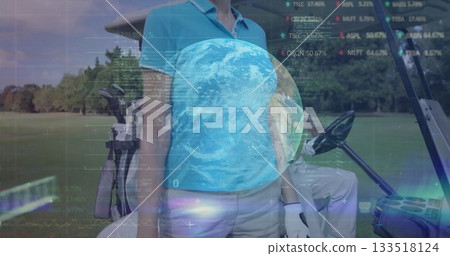 Standing woman wearing blue polo beige pants on golf fairway, with cart, clubs and digital overlays 133518124