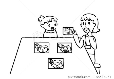 Children learning pronunciation with word cards 133518265