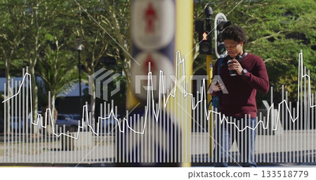 Walking man holding coffee cup, smartphone at urban street corner with waveform overlay, copy space Walking man holding coffee cup, smartphone at urban street corner with waveform overlay, copy space 133518779