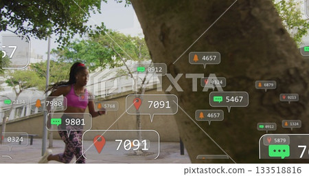 Jogging Black runner in sportswear on city path, holding phone showing AR data, copy space Jogging Black runner in sportswear on city path, holding phone showing AR data, copy space 133518816