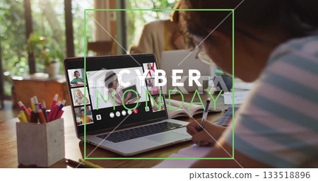 Woman taking notes at home desk for Cyber Monday call, with laptop, pencil holder, copy space Woman taking notes at home desk for Cyber Monday call, with laptop, pencil holder, copy space 133518896