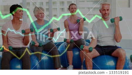 Balancing adults in sportswear holding green dumbbells at shoulders in gym, on blue stability balls Balancing adults in sportswear holding green dumbbells at shoulders in gym, on blue stability balls 133519191