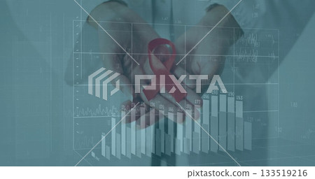 Cupping lab-coated hands holding red awareness ribbon above 3D bar and line graphs in clinic 133519216