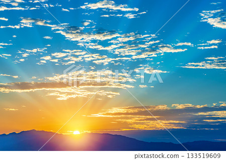 Mountain range and morning sun 133519609