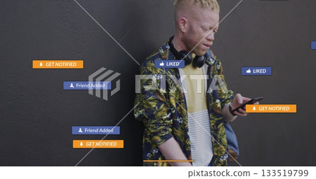 Scanning smartphone, man wearing leaf shirt, headphones on road, with floating UI icons, copy space 133519799