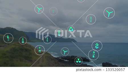 Displaying grassy hillside path running along coastal bluff, with floating digital icons 133520057