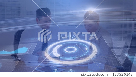 Colleagues in suits reviewing documents using holographic charts at conference table with tablet Colleagues in suits reviewing documents using holographic charts at conference table with tablet 133520145