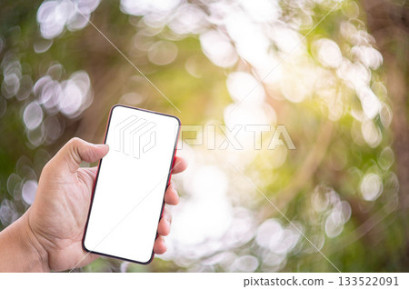The hand holding the phone that separated from white background technology clipping part 133522091