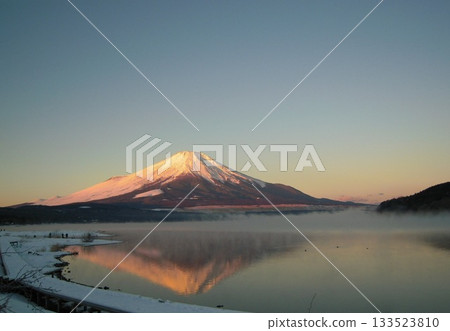 Mount Fuji reflected in Lake Yamanaka in the early morning Mount Fuji reflected in Lake Yamanaka in the early morning 133523810